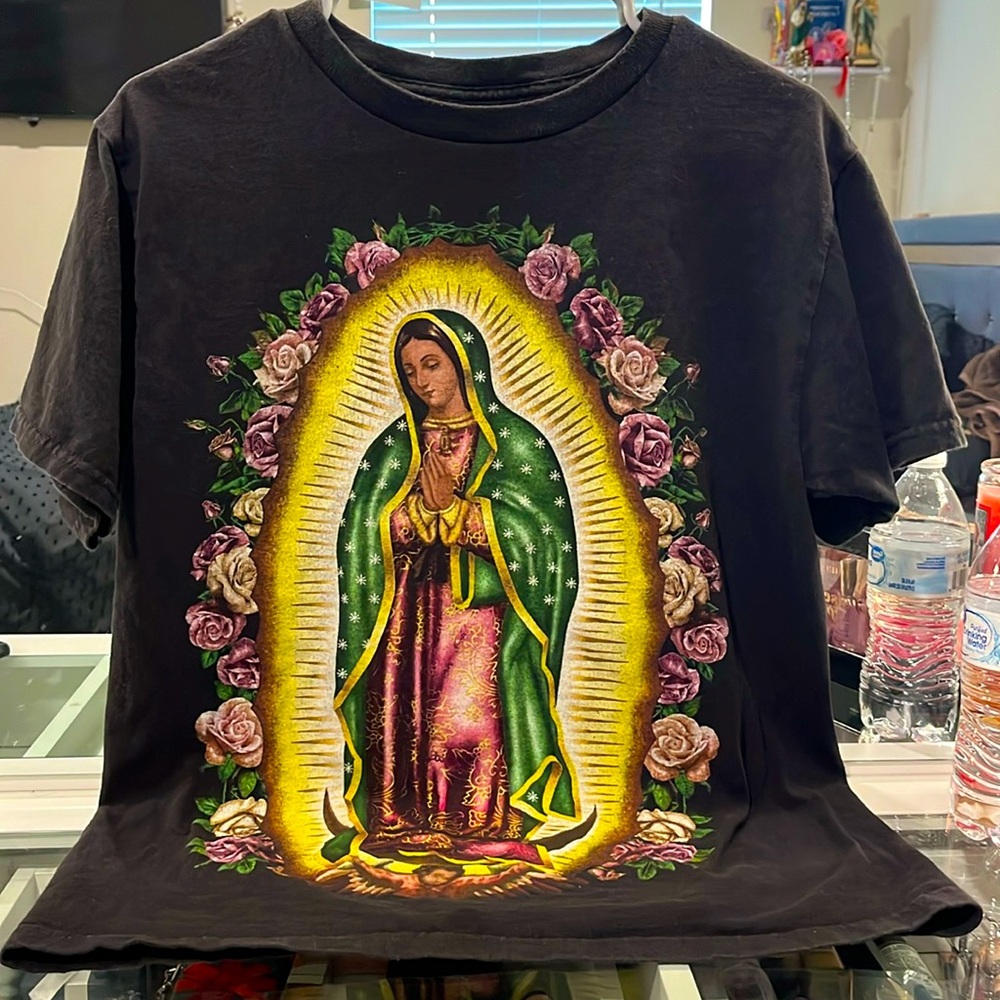 A virgen mary (virgencita) shirt it’s a size M